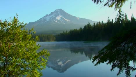 Steam-rises-from-Trillium-Lake-which-is-surrounded-by-pine-trees-near-Mt-Hood-in-Oregon-1