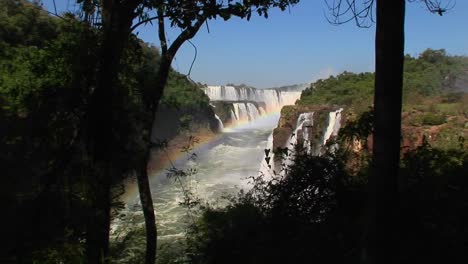 A-wide-shot-of-Iguacu-Falls-with-a-rainbow-in-the-foreground