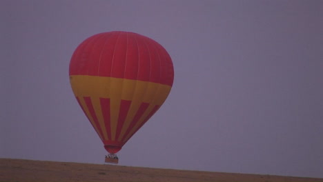 A-hot-air-balloon-rises-from-off-the-ground