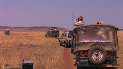 Four-off-road-vehicles-on-a-safari-in-the-desert