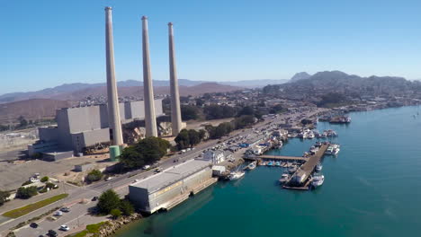 An-aerial-over-the-smokestacks-at-the-electrical-plant-in-Morro-Bay-California