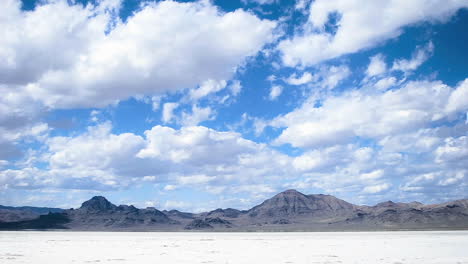 Time-lapse-of-clouds-moving-over-salt-flats-or-desert