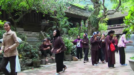 Vietnamese-women-practice-tai-chi-near-an-old-temple