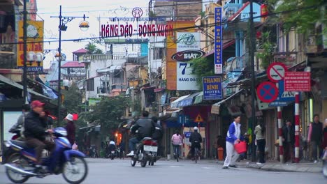 Pedestrians-walk-in-downtown-Hanoi