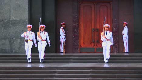 Soldiers-march-in-formation-outside-the-tomb-of-Ho-Chi-Minh-in-Hanoi-Vietnam