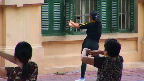 Vietnamese-women-do-a-modern-workout-in-the-morning