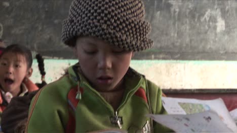 Children-practice-writing-in-a-rural-classroom-in-China-2