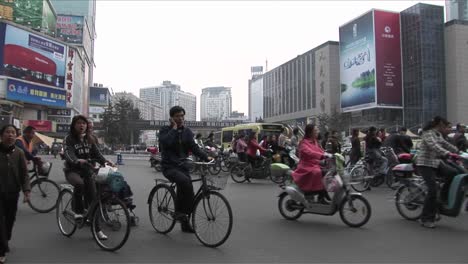 Crowds-of-people-and-bicycles-circulate-on-the-streets-of-Beijing-China