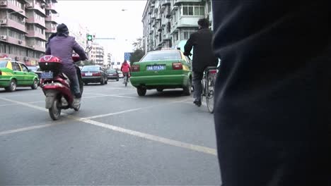 A-POV-shot-of-a-man-pedaling-a-rickshaw-through-the-streets-of-Beijing-China-2