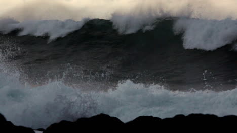 Huge-waves-roll-in-and-crash-against-a-rocky-shoreline-4