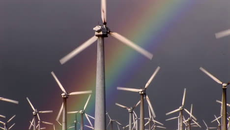 Gorgeous-rainbows-illuminate-wind-powered-generators-spinning