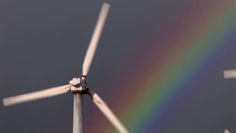 Gorgeous-rainbows-illuminate-wind-powered-generators-spinning-2