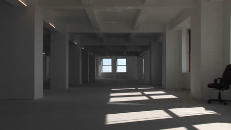 An-empty-building-from-inside-the-camera-zooms-towards-the-window