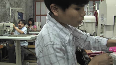 Asian-youths-sew-in-a-factory