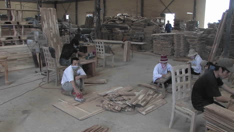 Wood-workers-hard-at-work-crafting-hand-made-furniture