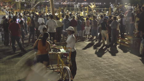 Panning-time-lapse-of-a-crowd-at-a-boxing-event-in-Zihuatanejo-Mexico