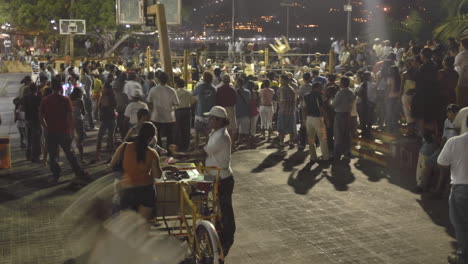 Time-lapse-of-a-crowd-at-a-boxing-event-in-Zihuatanejo-Mexico