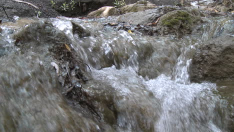 Point-of-view-close-up-over-a-small-waterfall-in-Los-Padres-National-Forest-above-Ojai-California