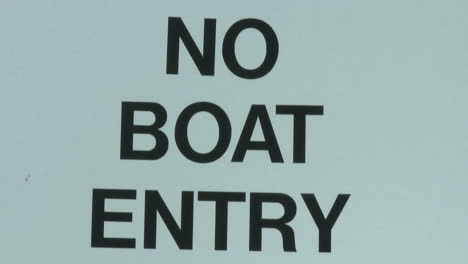 Tilt-down-on-No-Boat-Entry-sign-due-to-quagga-mussel-quarantine-at-Lake-Casitas-Recreation-Area-in-Oak-View-California