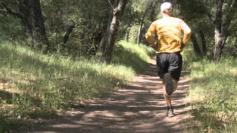 Man-trail-running-in-the-forest-on-the-Ventura-River-Preserve-in-Ojai-California