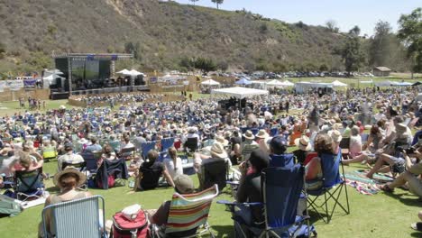 Full-day-time-lapse-of-a-crowd-at-an-outdoor-concert-in-Ventura-California