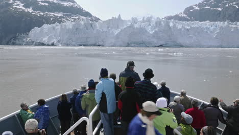 Point-of-view-Time-lapse-of-tourists-on-the-bow-of-a-ship-approaching-Margerie-Glacier-in-Glacier-Bay-National-Park-Alaska