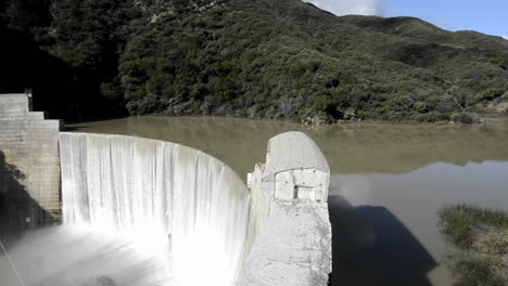 Side-view-from-above-Matilija-Creek-spilling-over-the-obsolete-Matilija-Dam-after-a-spring-storm-near-Ojai-California