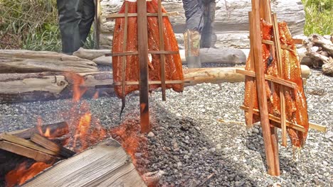 Cedar-plank-salmon-smoked-by-a-fire-at-Alert-Bay-British-Columbia-Canada-