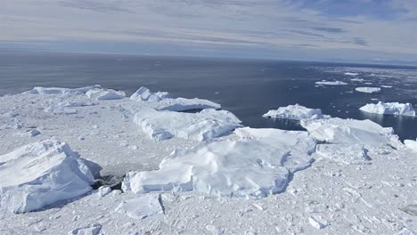 Aerial-of-ice-packed-into-the-Ilulissat-Icefjord-below-Jakobshavn-Glacier-or-Sermeq-Kujalleq-near-Ilulissat-Greenland