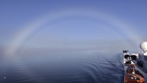Fog-bow-over-the-sea-ice-with-the-ship-at-80-degrees-north-in-Svalbard-Norway
