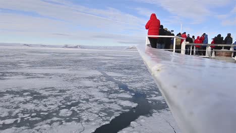 -Bow-of-the-National-Geographic-Explorer-breaking--sea-ice-in-Bellsund-near-Van-Mijenfjord