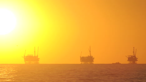 Day-to-night-time-lapse-of-the-sun-setting-behind-three-oil-platforms-in-the-Santa-Barbara-Channel-California-1