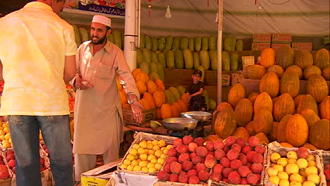 A-man-shops-in-a-fruit-market-in-Kabul-Afghanistan