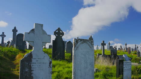 Nice-timelapse-of-clouds-moving-over-old-headstones-in-a-cemetery-or-graveyard