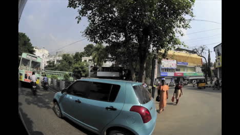 Dizzying-fisheye-time-lapse-of-traffic-on-an-Indian-road