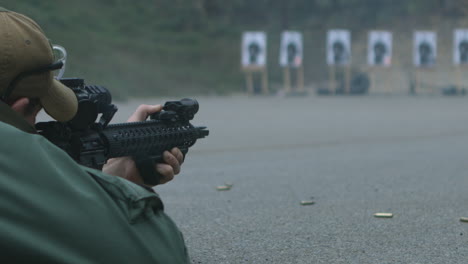 A-police-SWAT-team-office-fires-a-rifle-at-a-target-range-in-super-slow-motion