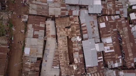 Aerial-shot-looking-straight-down-above-vast-overpopulated-slums-in-Kibera-Nairobi-Kenya-Africa