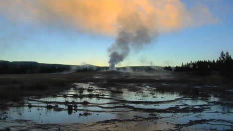 A-Geyser-Sends-Steam-Into-The-Sky-At-Yellowstone-National-Park