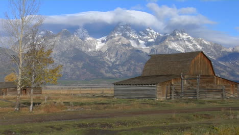An-Old-Barn-Stands-With-The-Grand-Teton-Mountains-In-The-Background