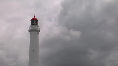 A-Lighthouse-Stands-Ready-In-The-Murk-Of-An-Overcast-Day