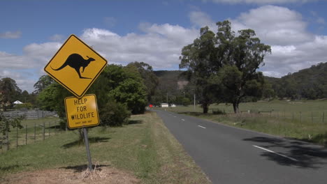 A-Kangaroo-Cross-Road-Sign-Stands-Next-To-A-Road