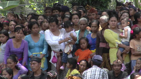 A-Crowd-Of-Women-And-Children-Stand-Together-In-Indonesia