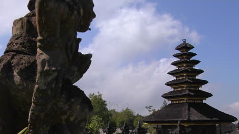 A-Statue-Of-A-Balinese-God-Looks-Out-Over-The-Besakih-Temple-Complex-In-Bali-Indonesia