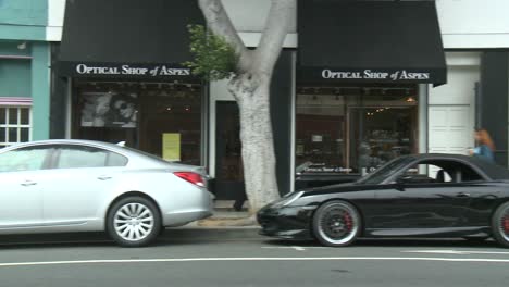 A-Car-Travels-Along-A-Street-In-Santa-Monica-California-As-Seen-Through-The-Side-Window-3