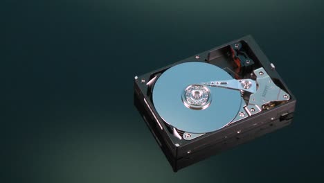 A-hard-drive-without-its-cover-rotates-on-display