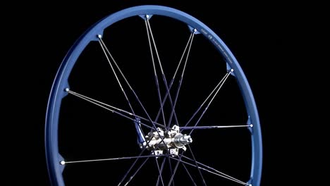 A-blue-wheel-with-spokes-revolves