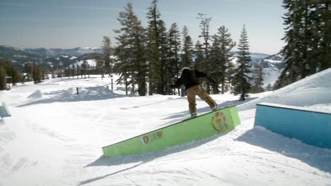 A-man-rides-on-a-snowboard
