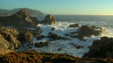 Waves-and-surf-from-a-winter-storm-pound-the-Big-Sur-Coastline-of-California-