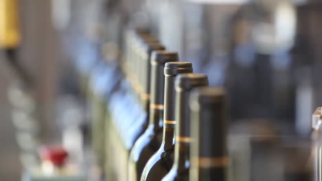 Close-up-shots-of-automation-along-the-assembly-line-inside-a-wine-bottling-factory-5