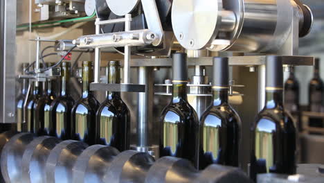 Close-up-shots-of-automation-along-the-assembly-line-inside-a-wine-bottling-factory-8